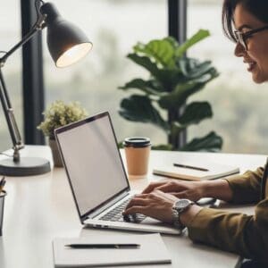 Flint business owner working on SEO and web design strategies in a modern office